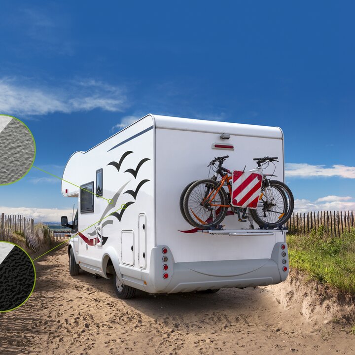 Signage vinyl artfully adorned on a mobile home, showcasing decorative motifs, travel-themed graphics, or personalized messages, adding character and style to the exterior of the residence on wheels.