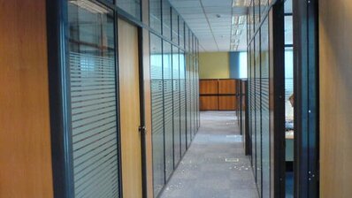 ORACAL® 8710 windows in office corridor with etched glass decor